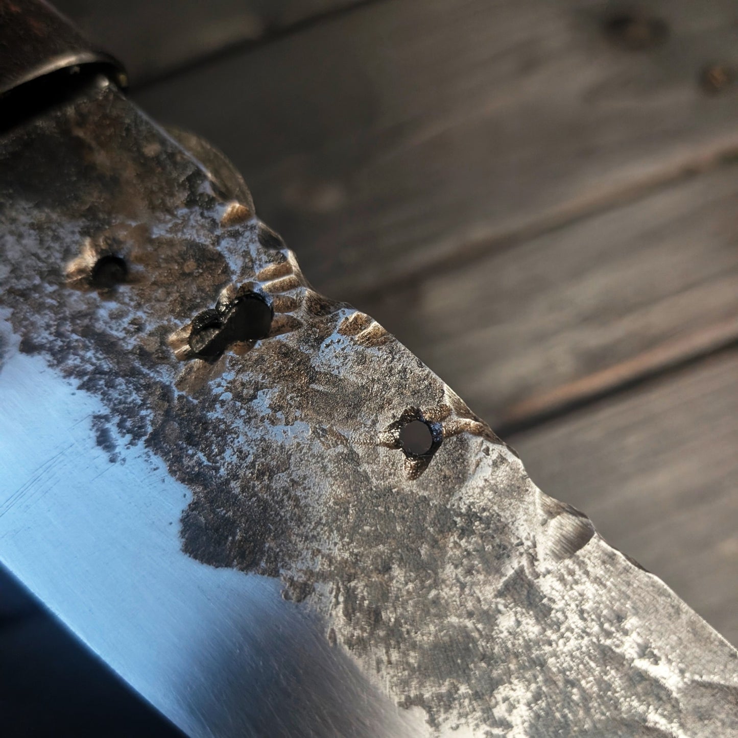 Chef knife - high carbon blade with holes in the spine and red handle